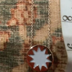 Light blue and silver sun necklace